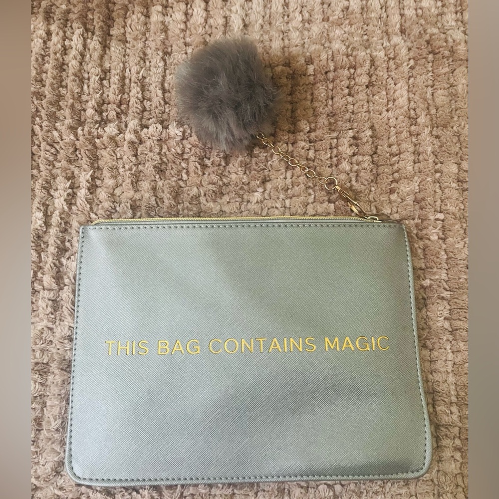 Gray Zip Pouch with Gold Text and Pom Pom